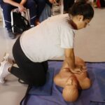 A días del IRONMAN, preparan a los voluntarios en RCP y primeros auxilios